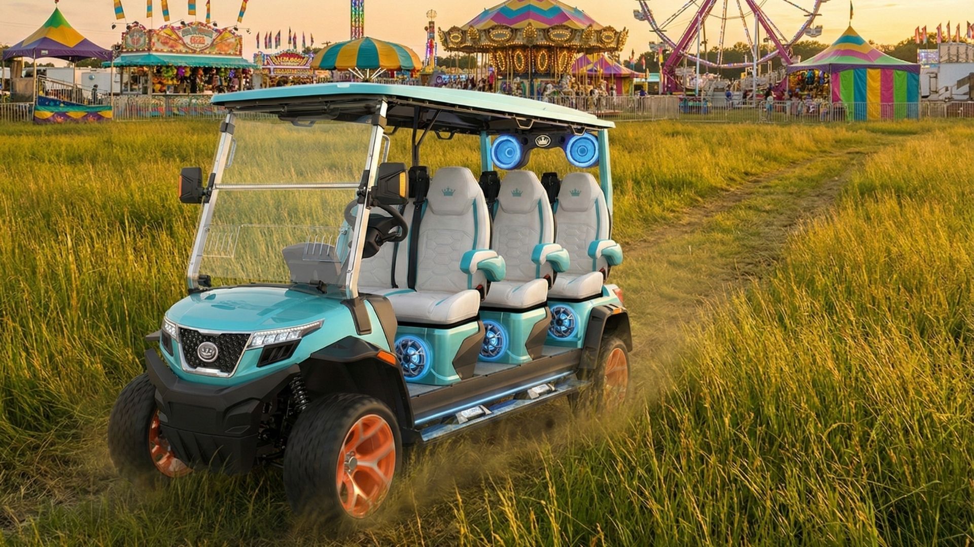 Teal All Seasons Golf Cart parked near county fair grounds with ferris wheel and carnival rides in summer sunset